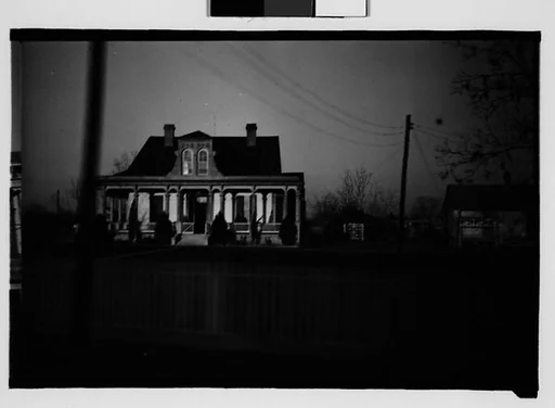 [House with Centered Roof Gable, From Moving Automobile, Between Reserve and Convent, Louisiana]
