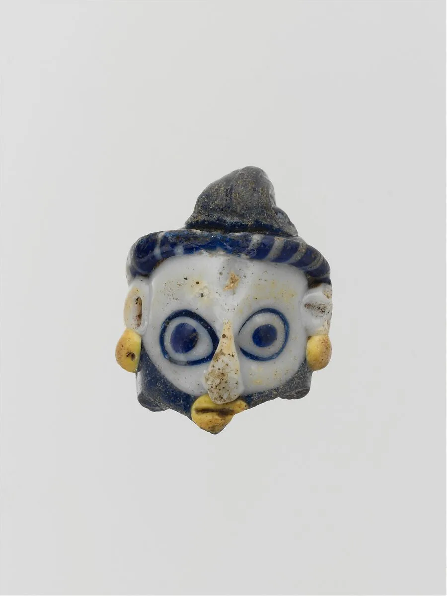 Glass head pendant — Unknown