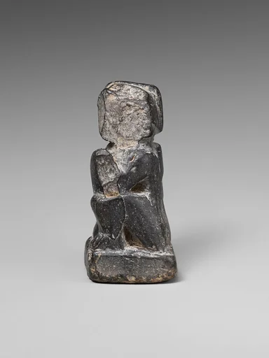 Seated figure