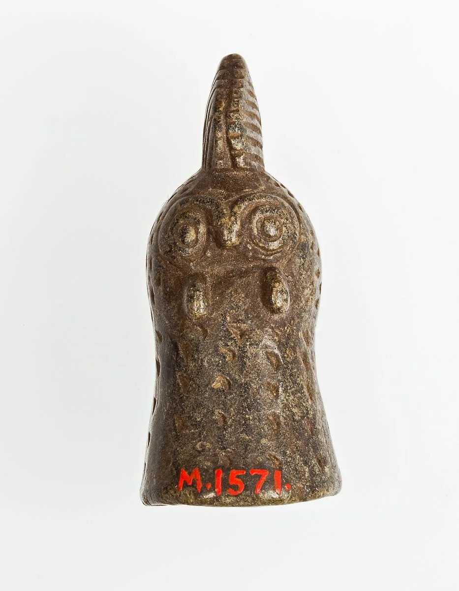 Game piece(?) in the shape of a bird's head — Unknown