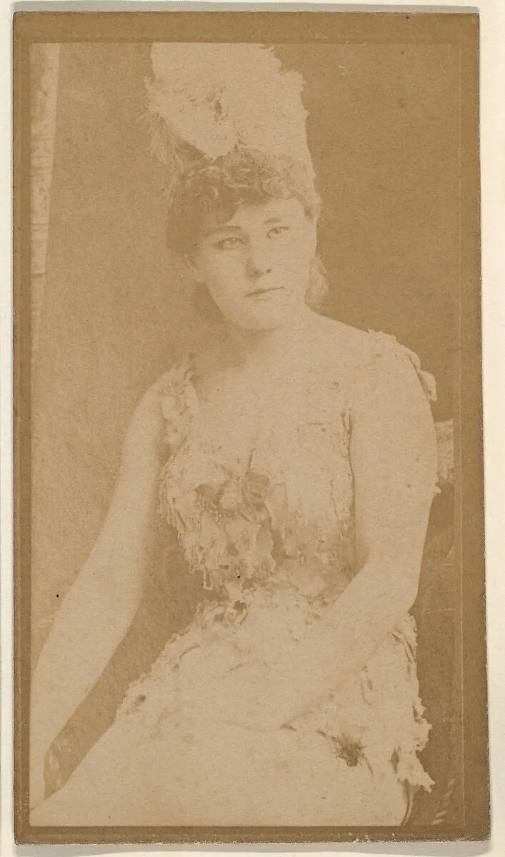 Seated actress wearing feathered hat, from the Actresses series (N668) — Unknown