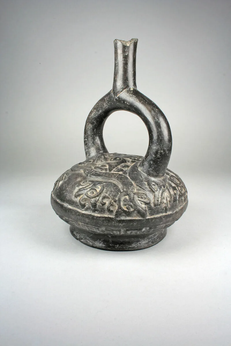 Stirrup Spout Bottle with Fanged Deity — Unknown