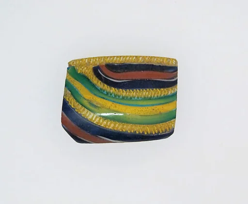 Glass striped mosaic bowl fragment