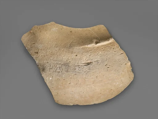 Limestone votive vase fragment