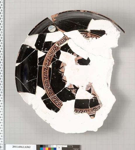 Terracotta fragment of a kylix (drinking cup)