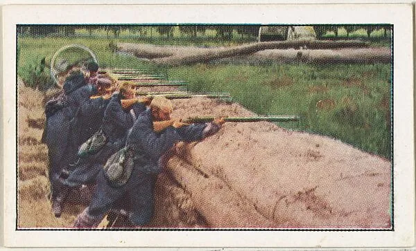 Card No. 179, Belgians Guarding Approaches to Antwerp Against Advance of Germans, from the World War I Scenes series (T121) issued by Sweet Caporal Cigarettes — Underwood & Underwood|American Tobacco Company