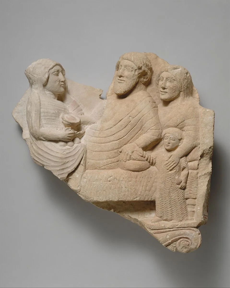 Fragment of a limestone grave relief with a banquet scene — Unknown