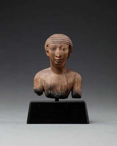 Upper Part of a Statue Probably Depicting a Man
