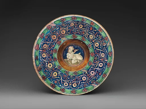 Wide-rimmed bowl with winged putto