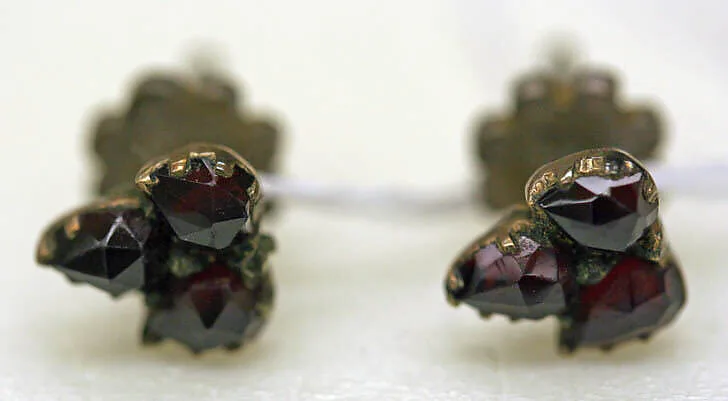 Pierced earrings — Unknown