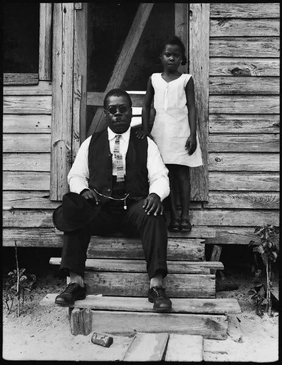 [Man and Young Girl on Front Steps of Wooden House, Florida]