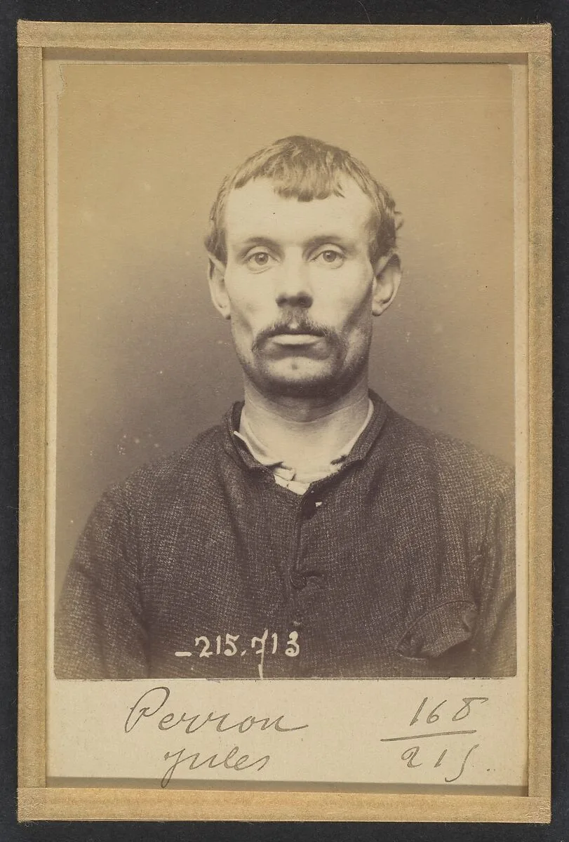 Perron. Jules. 31 ans, né le 9/8/62 à Saint-Denis (Seine). Journalier. Anarchiste. 75/3/94. — Alphonse Bertillon