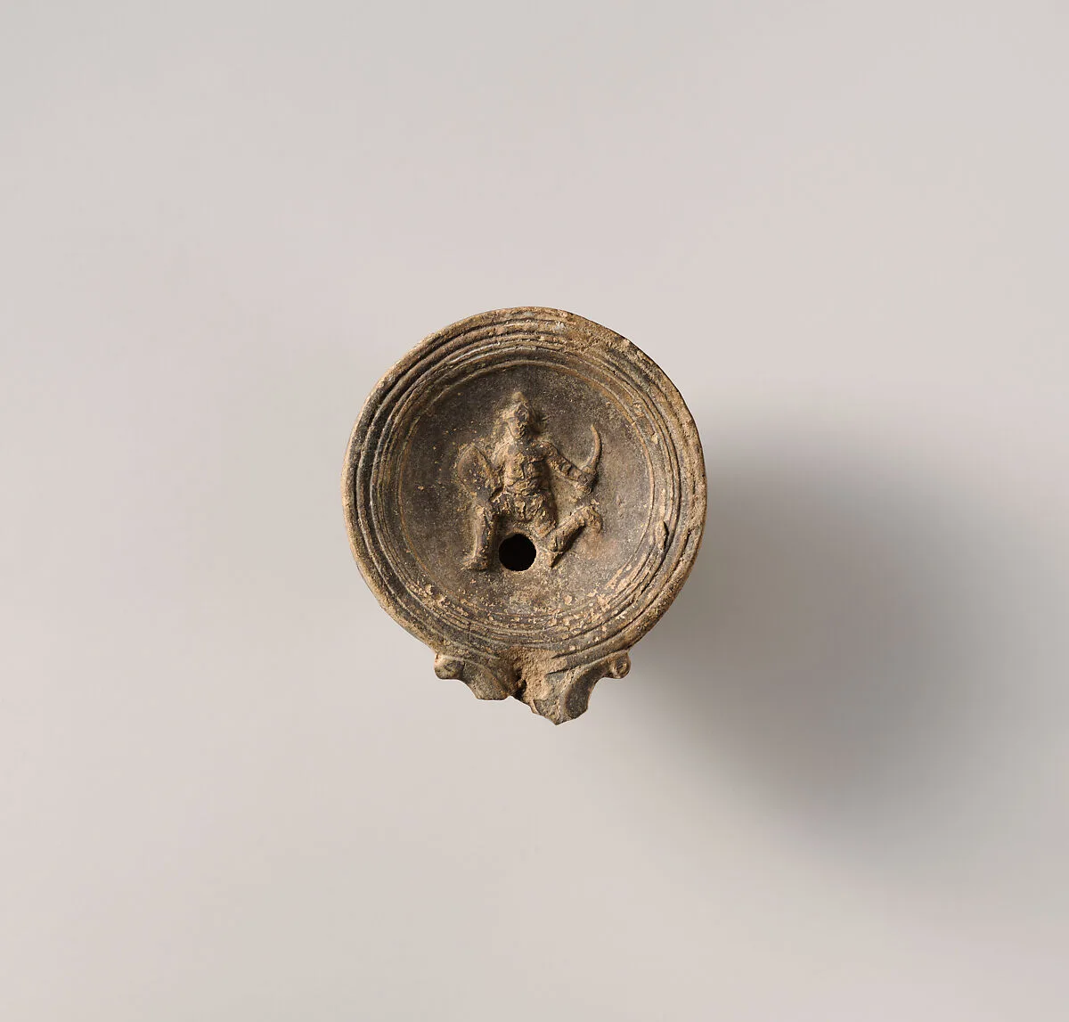 Terracotta oil lamp — Unknown