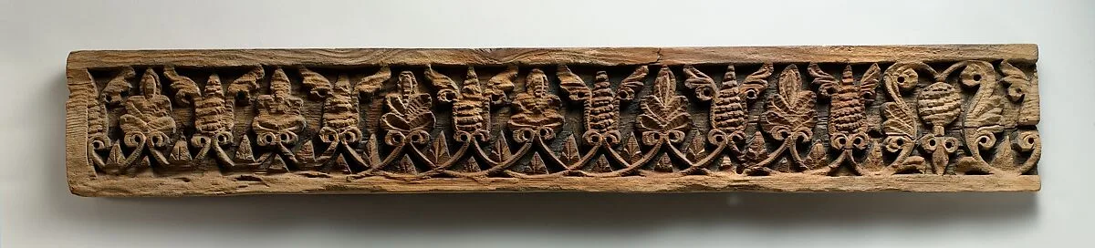 Fragment of a Frieze with Winged Pinecones and Palmettes — Unknown