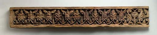 Fragment of a Frieze with Winged Pinecones and Palmettes