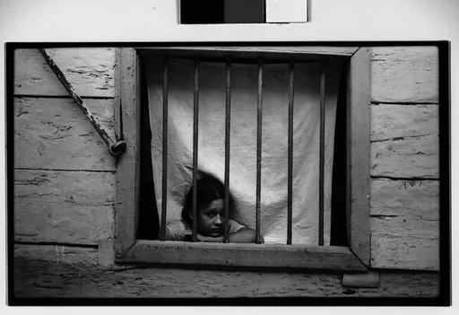 [Girl Behind Barred Window, Havana]