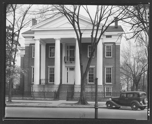 [Brick Greek Revival Building with Parked Car on Street, Augusta, Georgia]