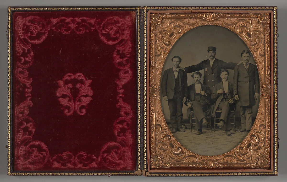 Policeman Posing with Four "Collared" Thugs — Unknown