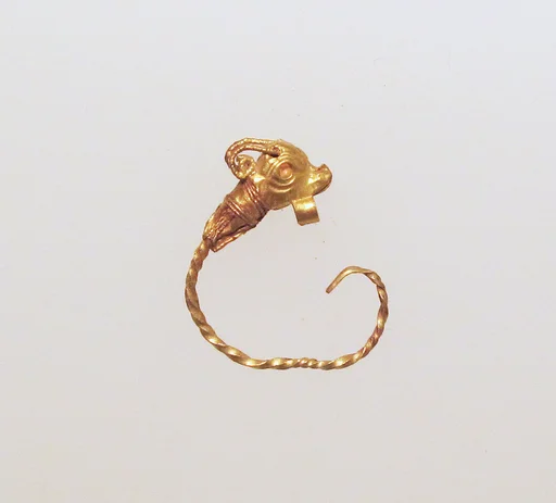 Gold earring with head of a goat