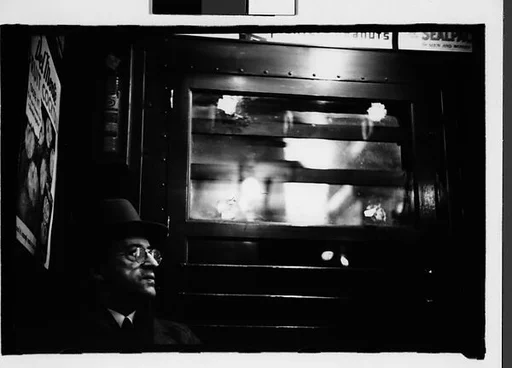 [Five 35mm Film Frames: Subway Passengers, New York City: Man Wearing Eyeglasses and Hat in Car Corner, Magazine Display at Subway Newsstand, Girl]