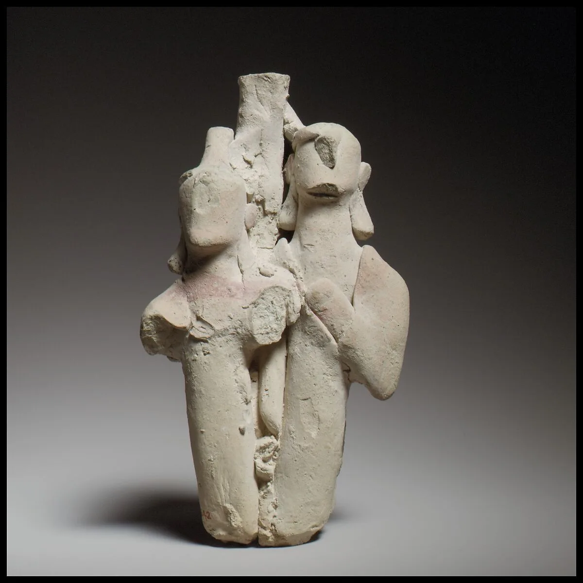 Group of three standing male figures — Unknown