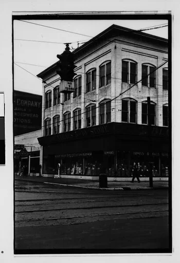 [Three 35mm Film Frames: Blumenthal's Five-and-Dime Store on Corner, Painted Fish Store Sign, Savannah Vicinity, Georgia]