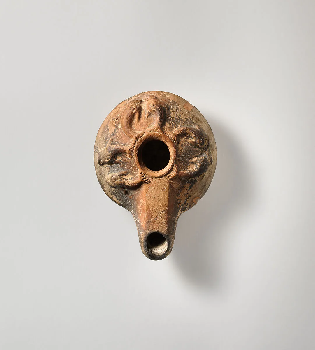 Terracotta oil lamp — Unknown