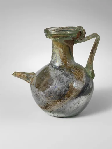 Glass spouted bottle