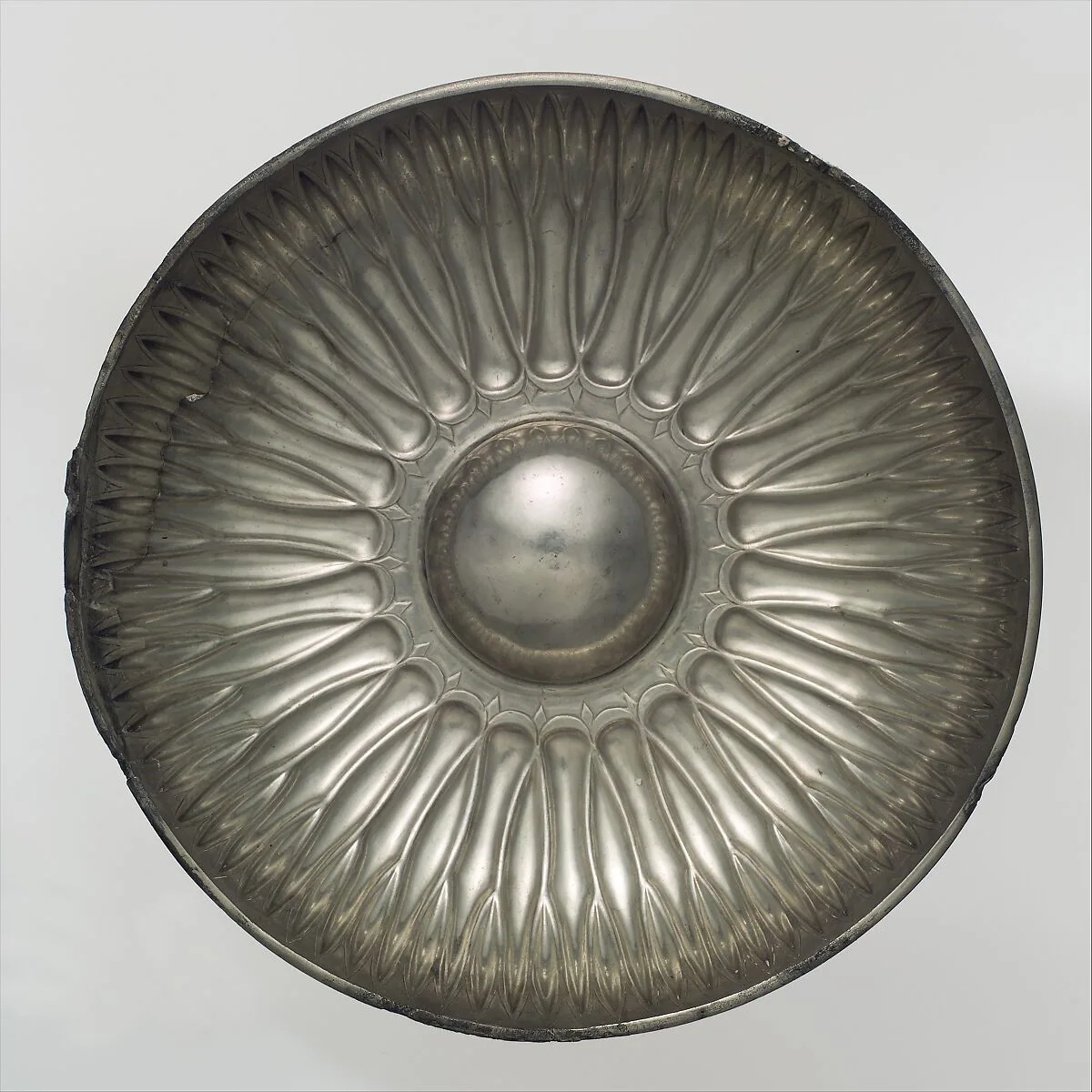Bowl with a radiating petal design — Unknown