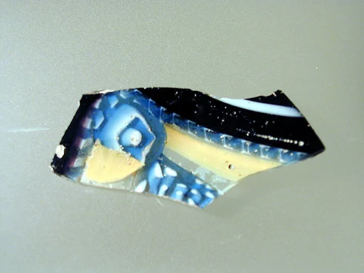 Glass striped mosaic bowl fragment