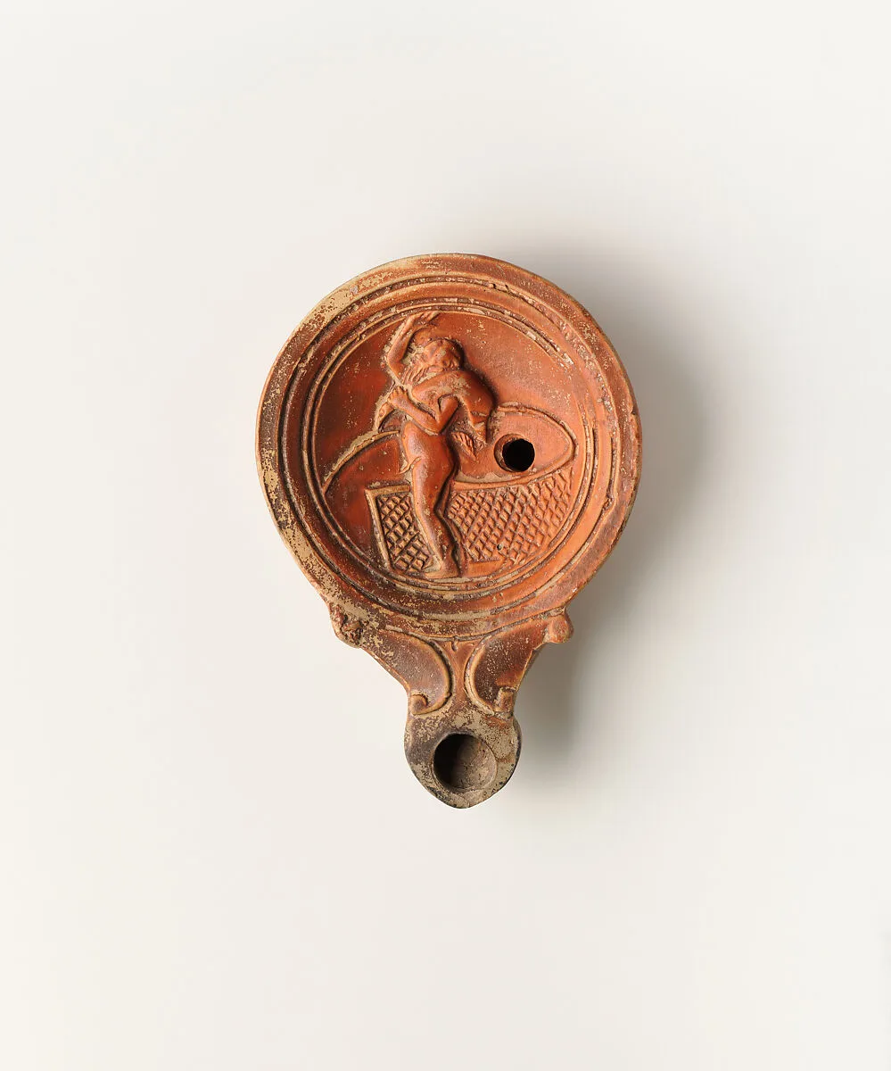 Terracotta oil lamp — Unknown
