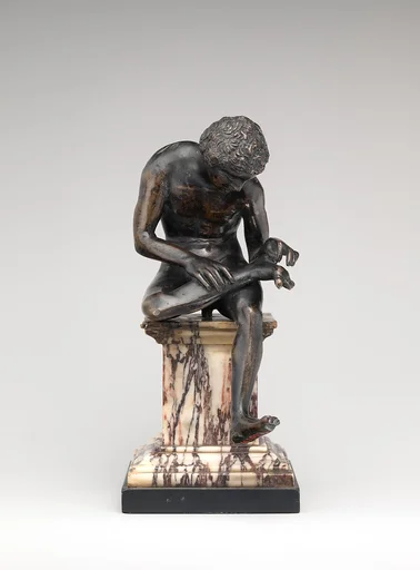 Spinario (boy pulling a thorn from his foot)