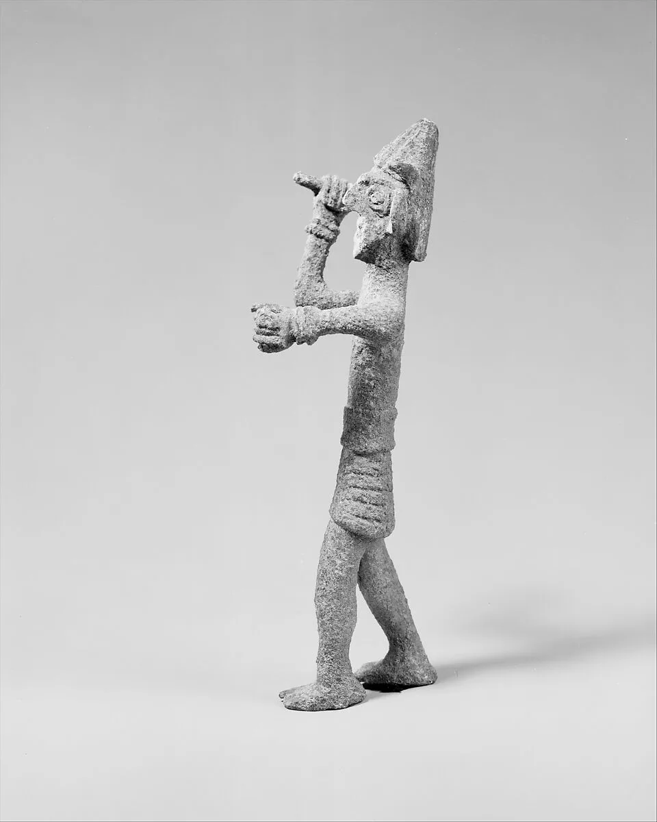 Smiting weather god or warrior with horned headgear — Unknown