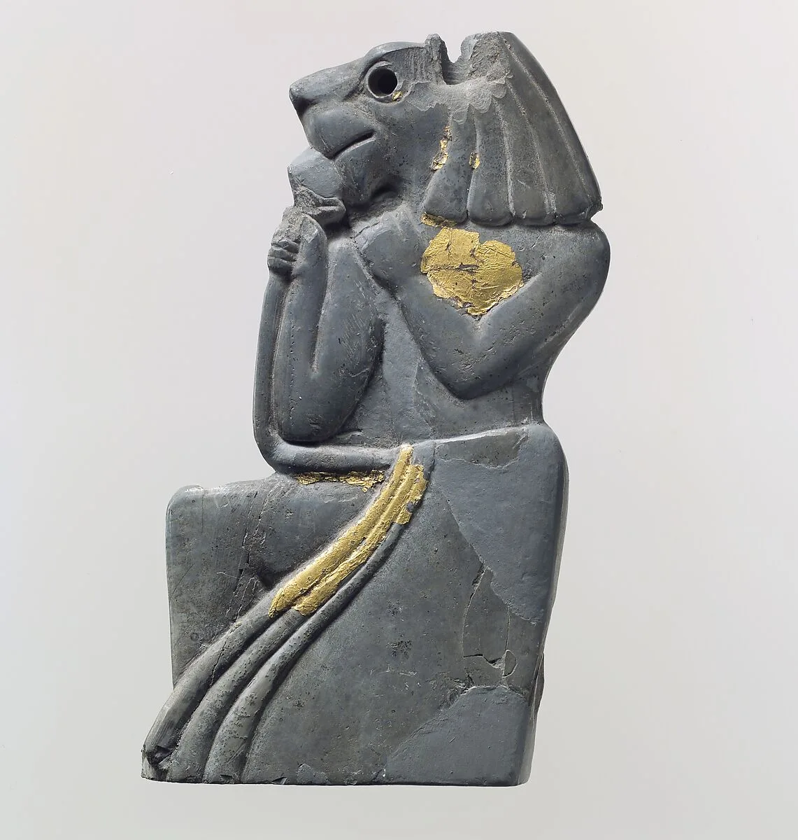 Plaque fragment: kneeling lion-headed figure — Unknown