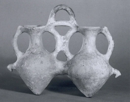 Double vessel with pierced bases