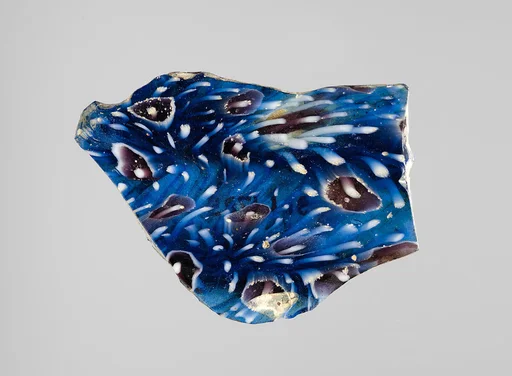 Glass mosaic ribbed bowl fragment