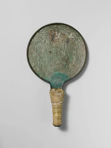 Bronze mirror with ivory handle