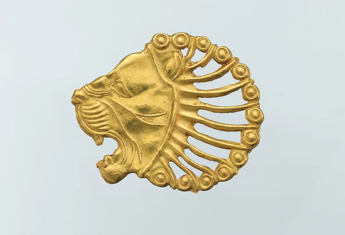 Applique in the shape of a lion's head — Unknown