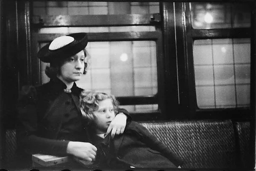 [Five 35mm Film Frames: Subway Passengers, New York City: Woman in Velvet Collar with Arm Around Child, Mother and Child, Woman in Polkadot Dress and Little Girl]