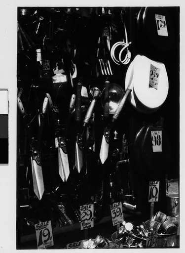 [Three 35mm Film Frames: Hardware Store Display of Hanging Shears and Toilet Seats, Brooklyn, New York]
