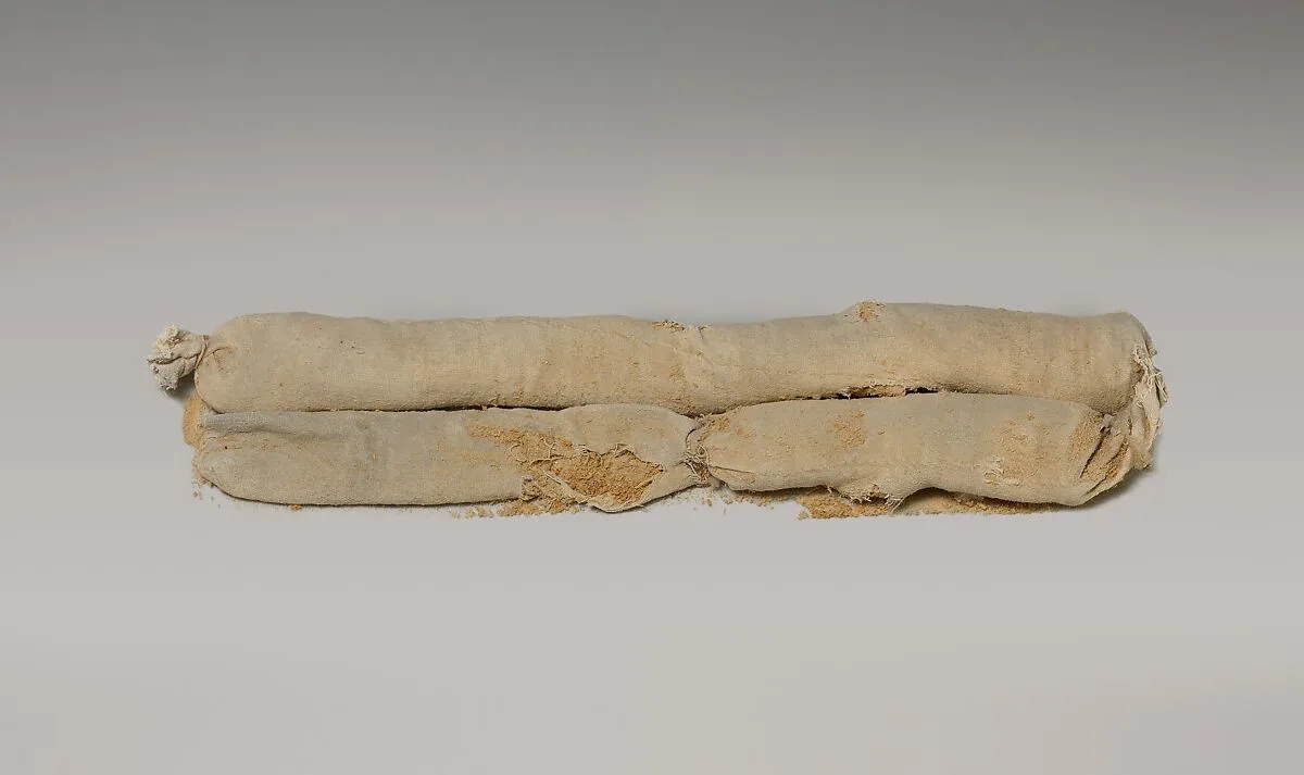 Cylindrical bag of sawdust from Tutankhamun's Embalming Cache — Unknown