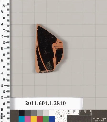 Terracotta fragment of a kylix (drinking cup)