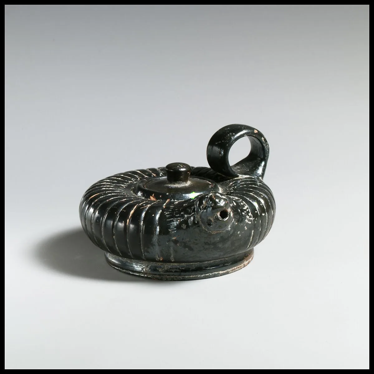 Terracotta guttus (flask with handle and vertical spout) — Unknown