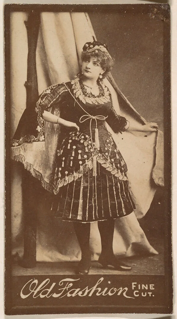 Actress holding studio curtain, from the Actresses series (N664) promoting Old Fashion Fine Cut Tobacco — Unknown