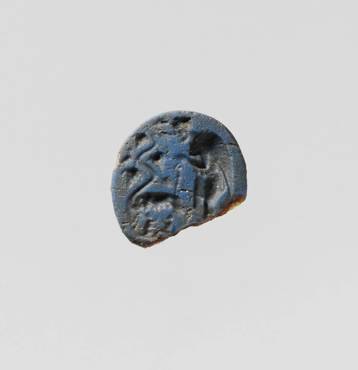 Opaque blue glass oval engraved gem — Unknown