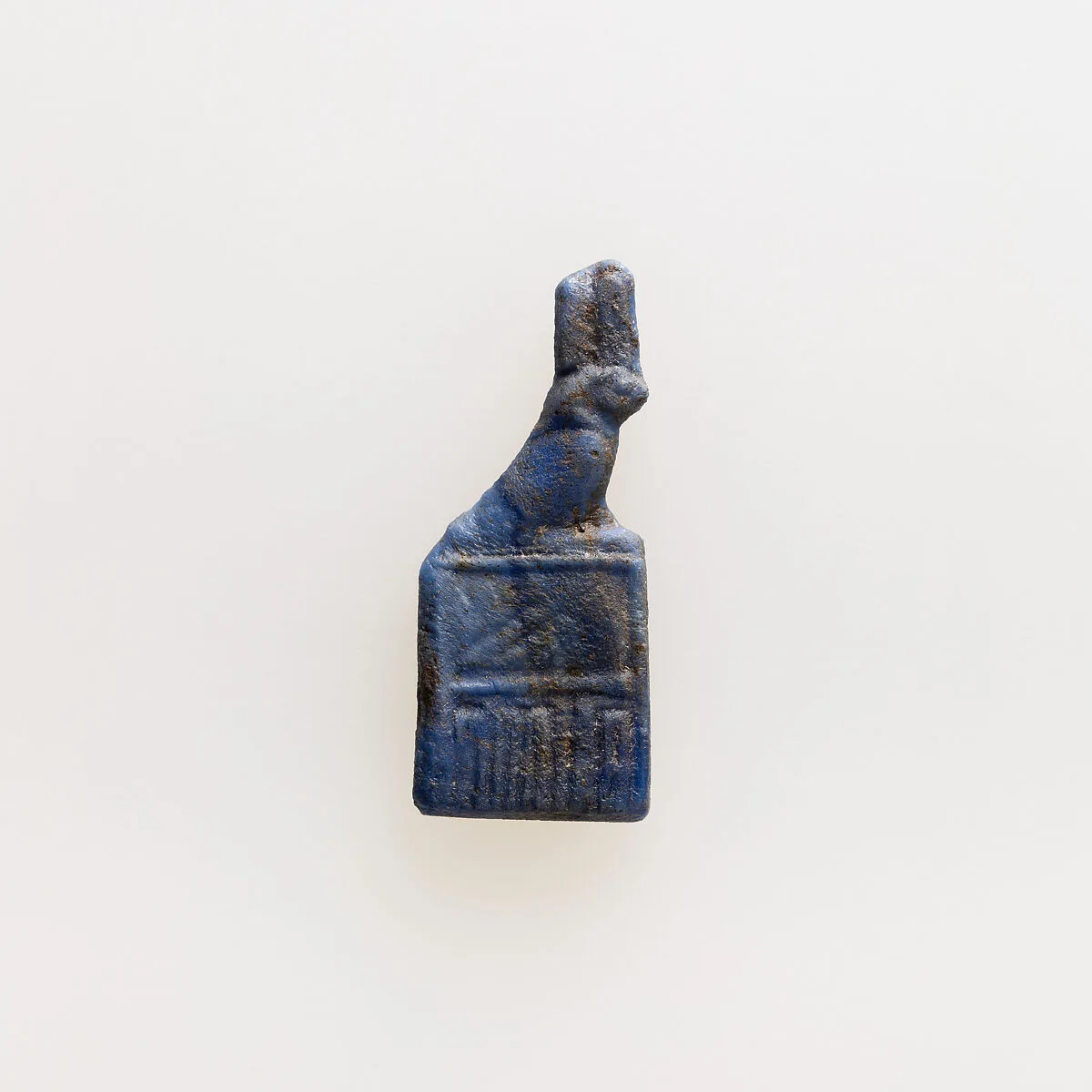 Amulet of serekh sign surmounted by archaic falcon — Unknown