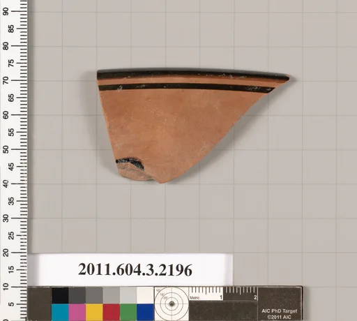 Terracotta rim fragment of a kylix (drinking cup)