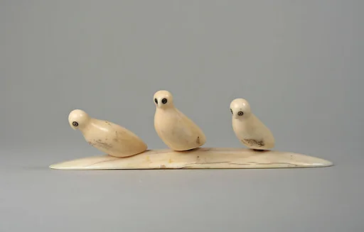Three Ivory Owls on Base
