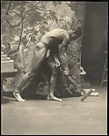 [Male Model Posed Before Backdrop of Painted Trees]