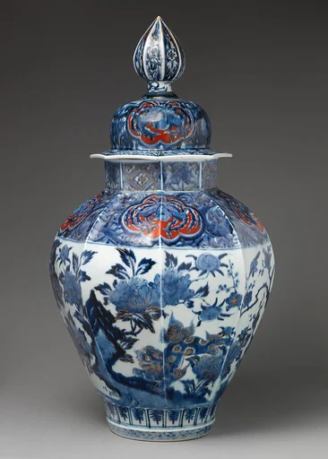 Covered jar with large finial